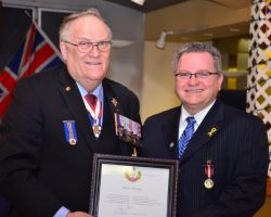 Receiving the Queens Jubilee Medal